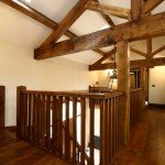 Three quarter king post truss used to create a stunning feature above the main staircase.